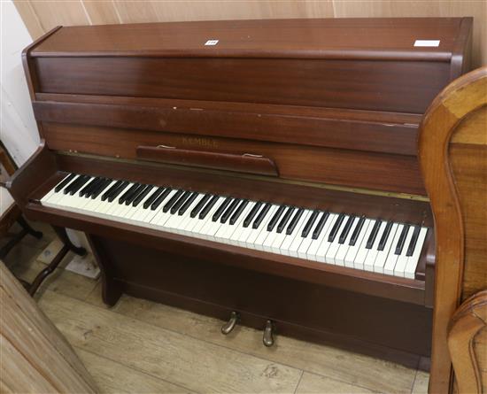 A Kemble upright piano